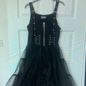 Chic Black Mini Dress with Zipper and Lace-Up Design